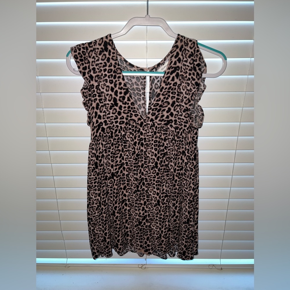 A leopard print romper, built in shorts it looks like a dress though.